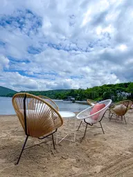 Acapulco chair - Beige used in the inspiration Entourage Sur Le Lac   Plage   Acapulco EN